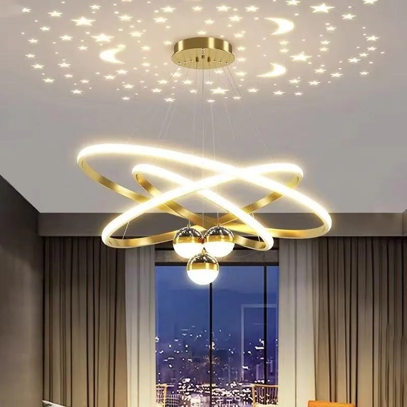 Lámpara Colgante LED Dorada de Tres Anillos con Esferas